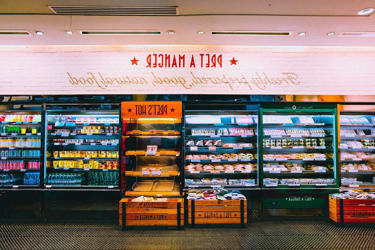 vending machine assorted-color beverage cooler inside store machine